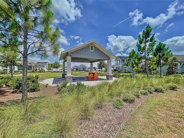 view of yard featuring a gazebo and ceiling fan