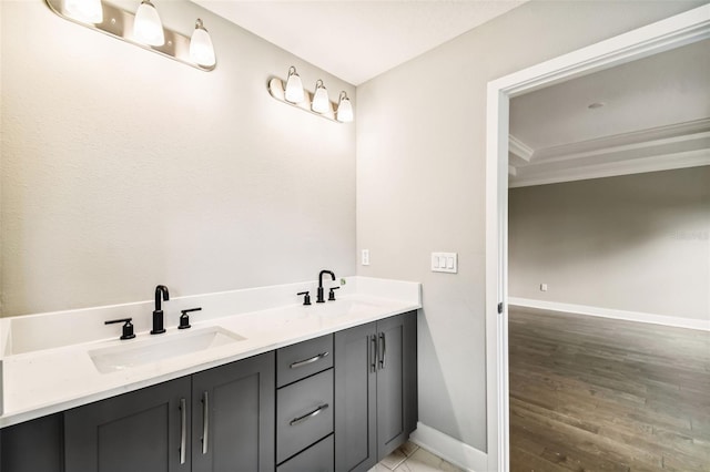 bathroom featuring hardwood / wood-style flooring and vanity