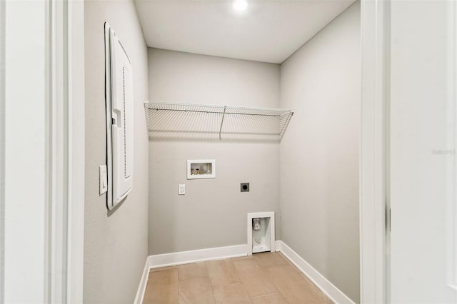 washroom featuring hookup for an electric dryer, washer hookup, and light wood-type flooring