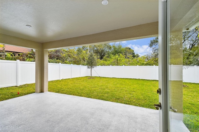 view of patio with a fenced backyard