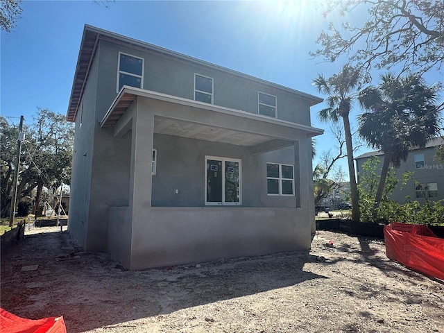 view of home's exterior with stucco siding