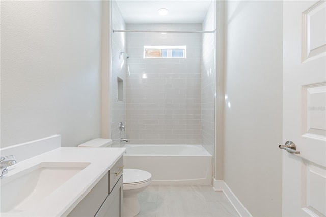 bathroom featuring toilet, washtub / shower combination, and vanity