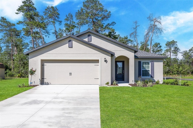 ranch-style home featuring a front lawn and a garage