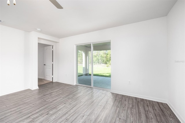 unfurnished room with light hardwood / wood-style flooring