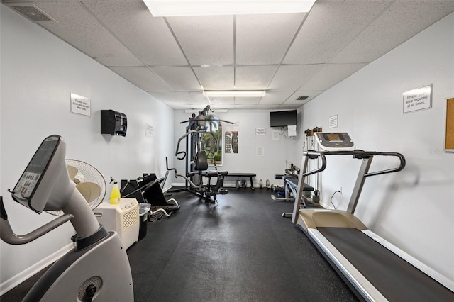 exercise area featuring a drop ceiling