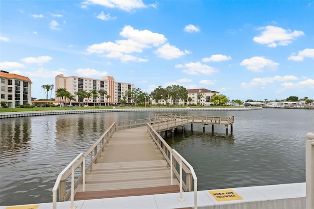 dock area featuring a water view