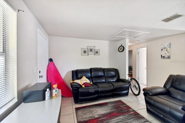 living room with light tile patterned floors