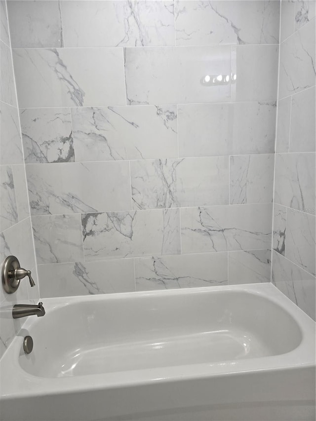 bathroom featuring shower / bathtub combination