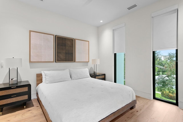 bedroom featuring light hardwood / wood-style flooring