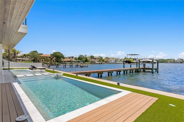 view of pool featuring a boat dock and a water view