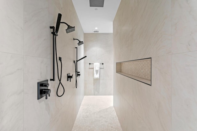 interior space with a tile shower