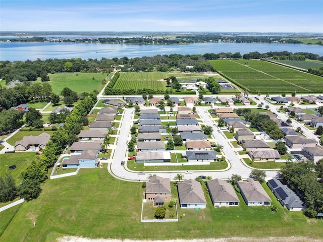 bird's eye view with a water view