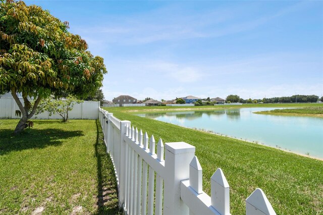 exterior space with a water view