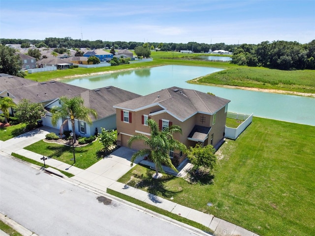 bird's eye view with a water view