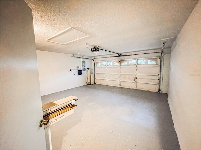 garage featuring a garage door opener and electric panel