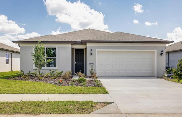 8322 SW 52nd Lane Rd, Ocala, FL 34481 - single story home featuring roof with shingles, stucco siding, an attached garage, and driveway