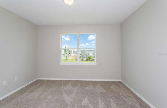 8322 SW 52nd Lane Rd, Ocala, FL 34481 - carpeted empty room featuring baseboards