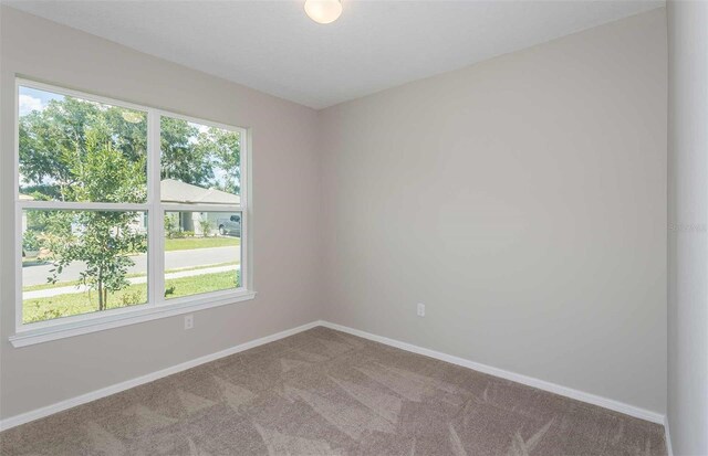 8322 SW 52nd Lane Rd, Ocala, FL 34481 - carpeted empty room with baseboards