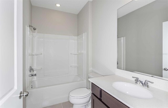 8322 SW 52nd Lane Rd, Ocala, FL 34481 - full bath featuring toilet, shower / bathing tub combination, tile patterned flooring, and vanity