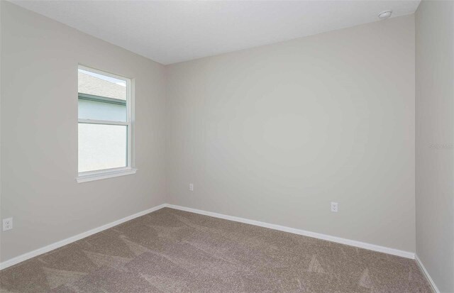 8322 SW 52nd Lane Rd, Ocala, FL 34481 - unfurnished room featuring baseboards and carpet