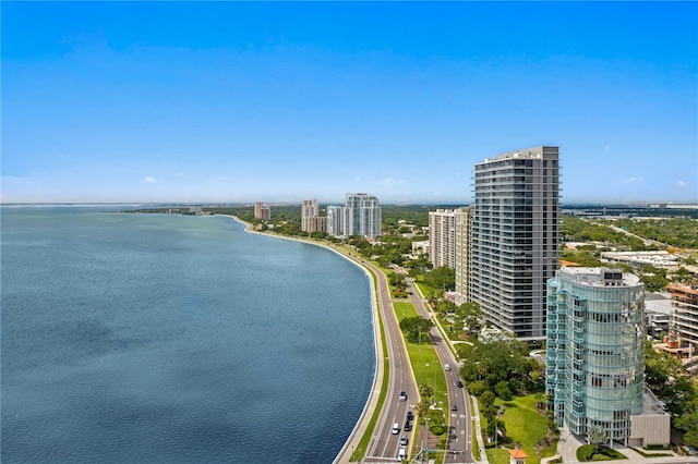 bird's eye view featuring a water view and a city view