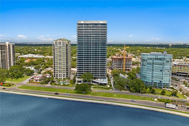 aerial view featuring a water view and a city view