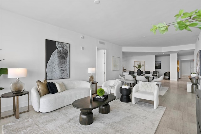 living room with light hardwood / wood-style floors