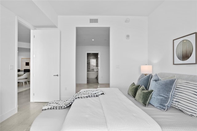 bedroom featuring ensuite bathroom