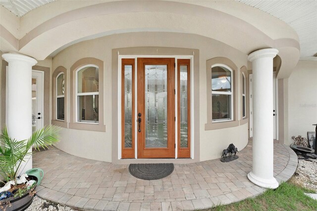 property entrance featuring french doors