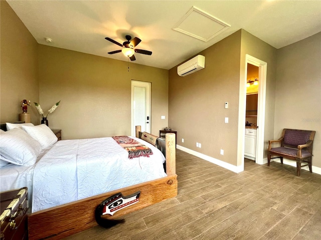 bedroom with a wall unit AC, ceiling fan, and hardwood / wood-style floors