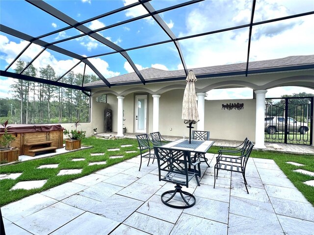 sunroom featuring decorative columns