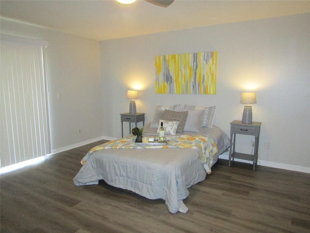 bedroom featuring ceiling fan and dark hardwood / wood-style floors