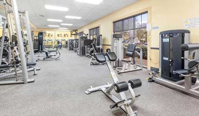 workout area with a drop ceiling