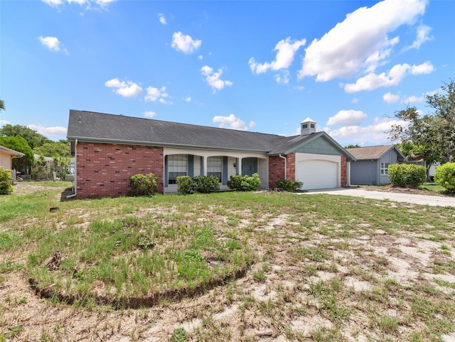 single story home with a garage