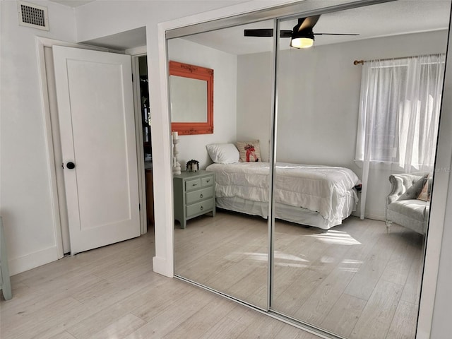 bedroom featuring ceiling fan and light wood-type flooring