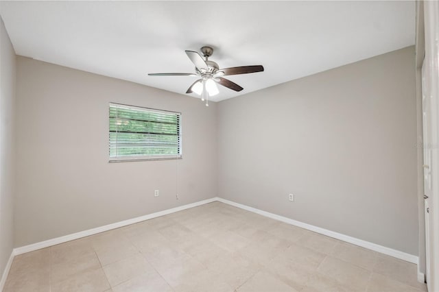 spare room with ceiling fan