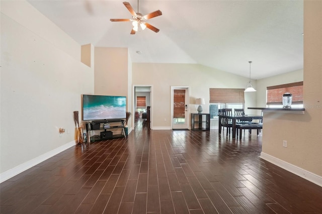 living room with vaulted ceiling and ceiling fan