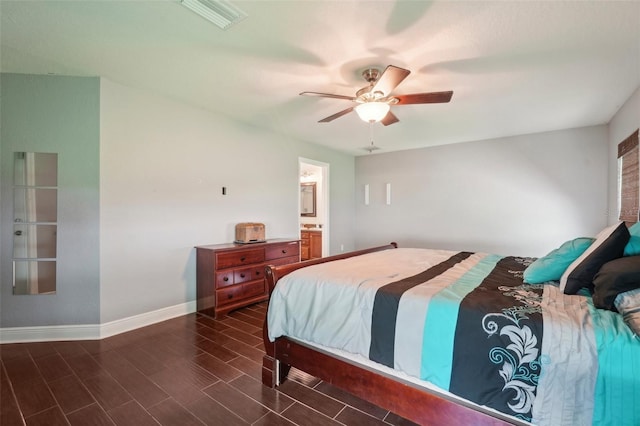 bedroom featuring ceiling fan and ensuite bathroom