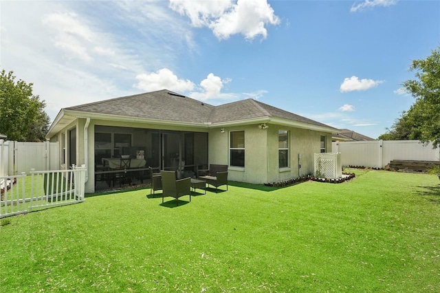 rear view of house with central AC unit, a lawn, and a sunroom