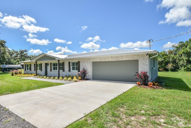 ranch-style house with a garage and a front lawn