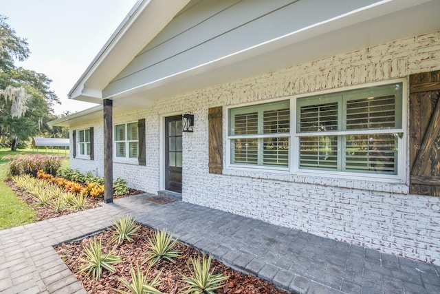 doorway to property featuring a patio