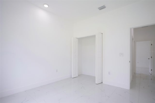 unfurnished bedroom with light tile patterned floors