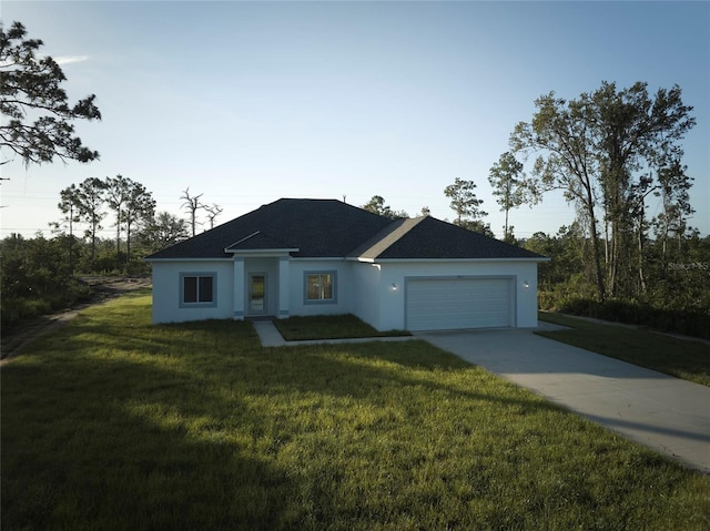 ranch-style house with driveway, an attached garage, a front lawn, and stucco siding