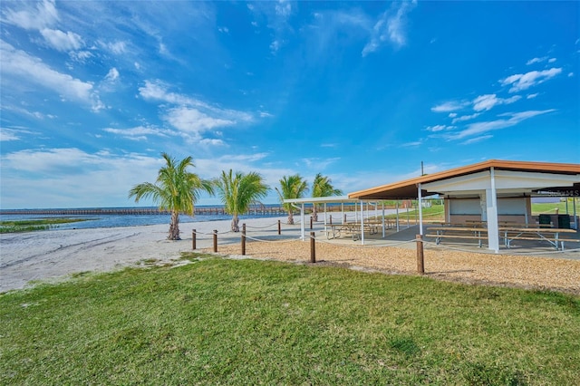 view of yard with an outbuilding and a water view