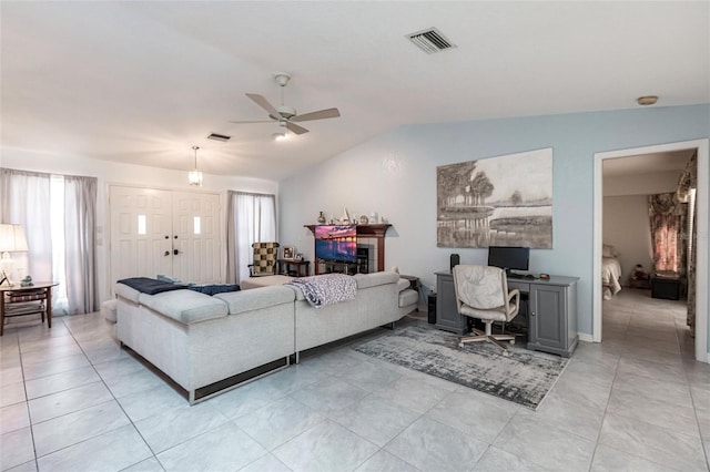 tiled living room with lofted ceiling and ceiling fan