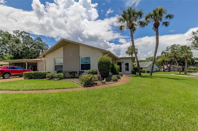 exterior space with a front lawn