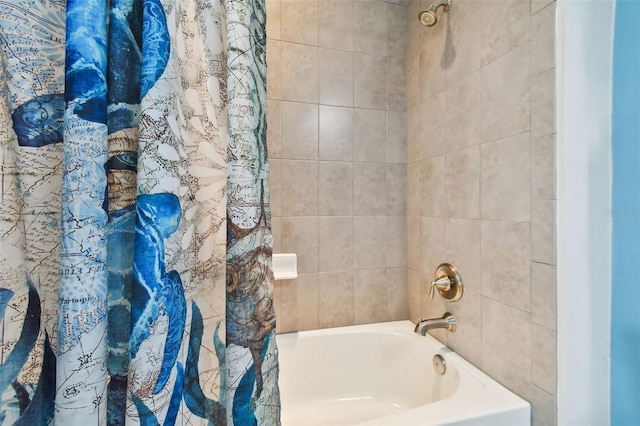 bathroom featuring shower / bathtub combination with curtain