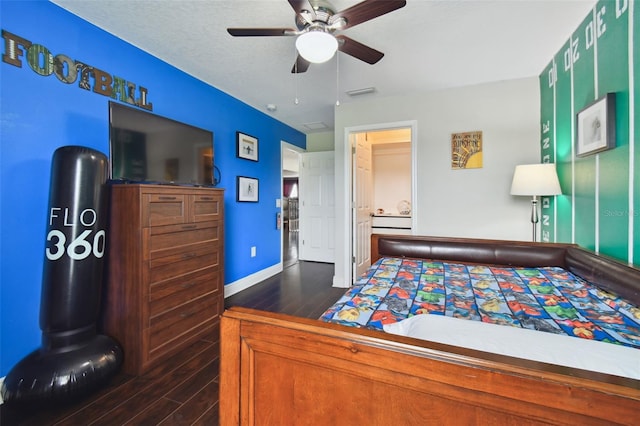 bedroom featuring dark wood-style floors, visible vents, a ceiling fan, a textured ceiling, and baseboards