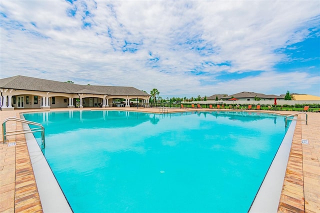 view of swimming pool featuring a patio