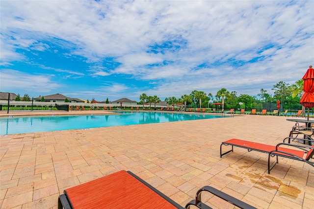 view of pool featuring a patio area